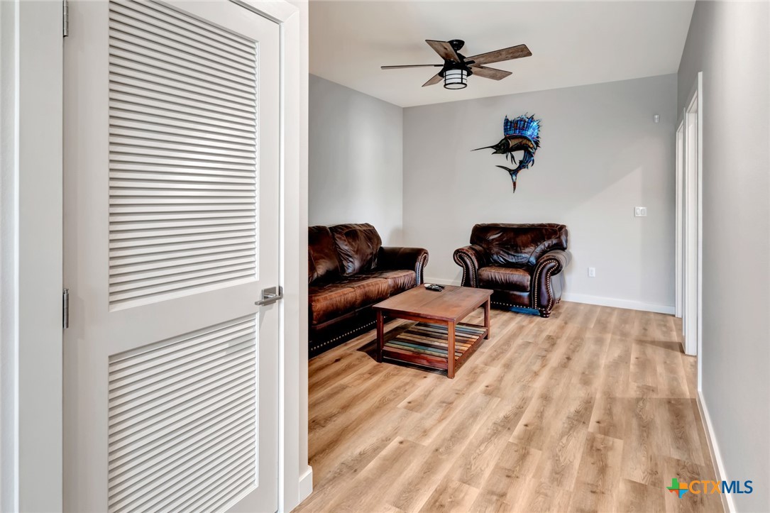 52 Coastal Oaks Loop Port O'Connor, TX 77982 - Photo 17 of 23 a view of livingroom with furniture and windows
