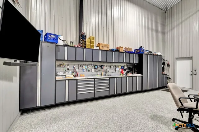 a view of a kitchen with furniture and window