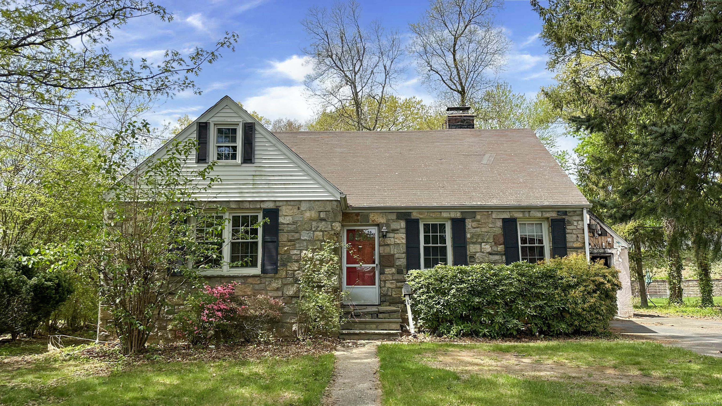 26 Pershing Avenue Stamford, CT 06905 - Photo 1 of 1 a view of a house with garden and plants