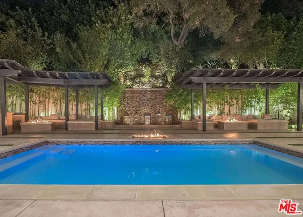 a view of a house with a swimming pool
