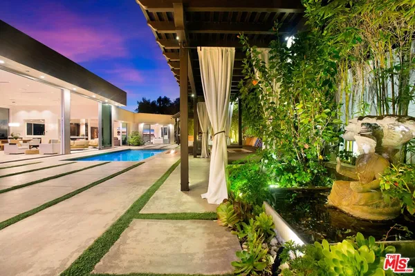 a view of a house with a swimming pool