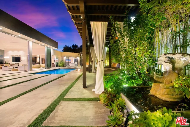 a view of a house with a swimming pool