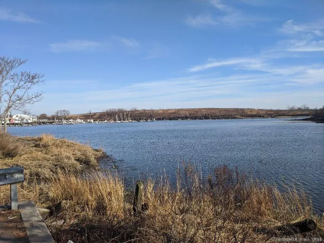 a view of lake with mountain in background