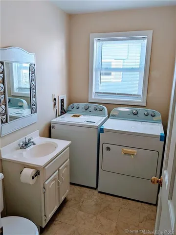 a utility room with dryer and washer