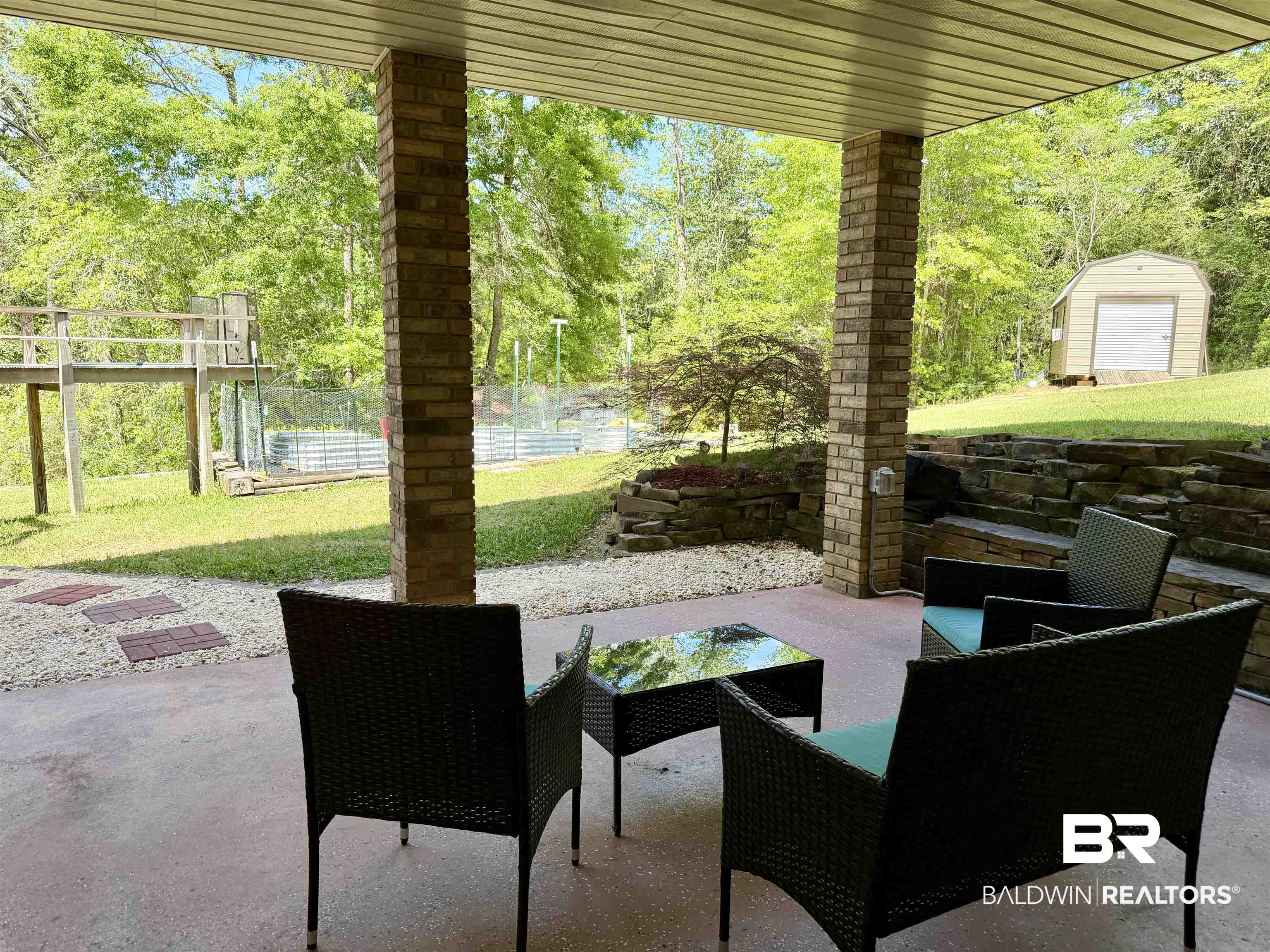 2944 Appleton Road Brewton, AL 36426 - Photo 48 of 65 View of patio with a storage unit and outdoor lounge area