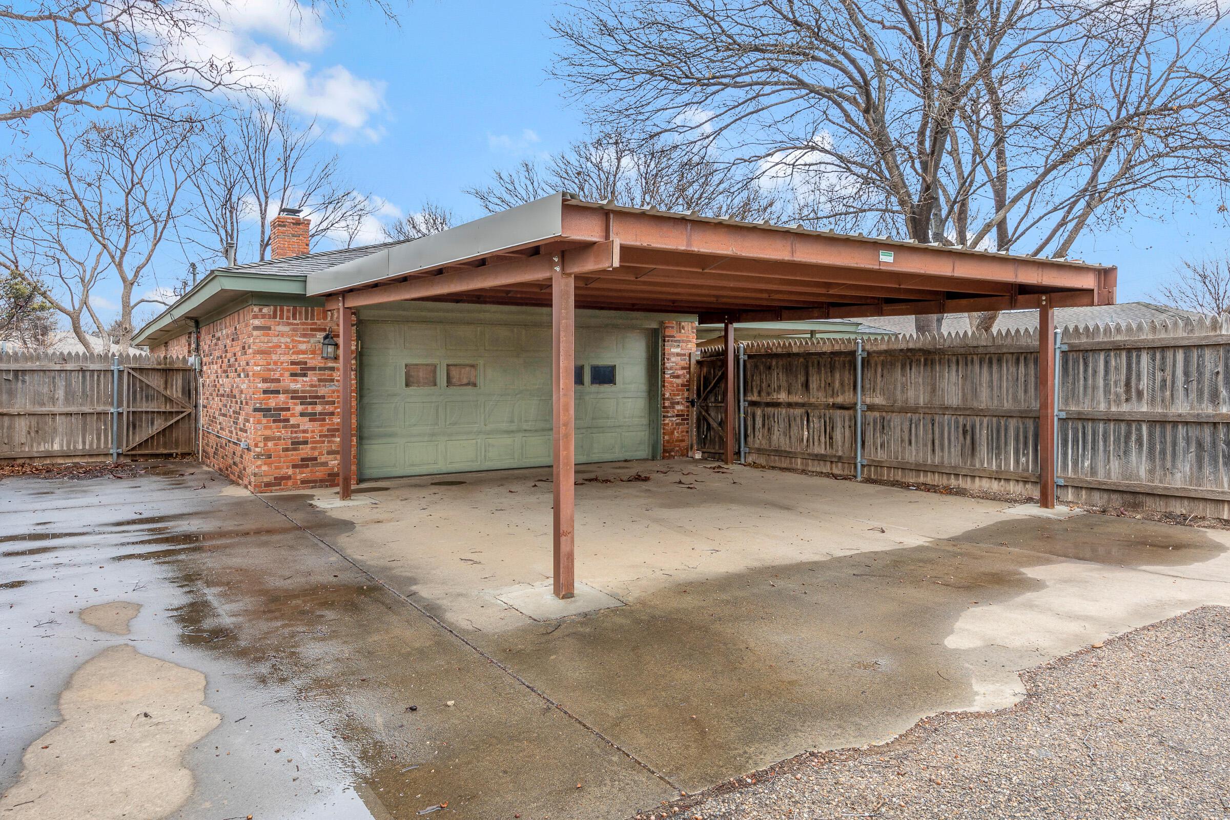 6903 Dreyfuss Road Amarillo, TX 79106 - Photo 27 of 27 a view of a house with a outdoor space