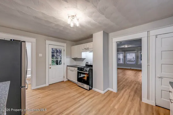 a view of a hallway with entryway