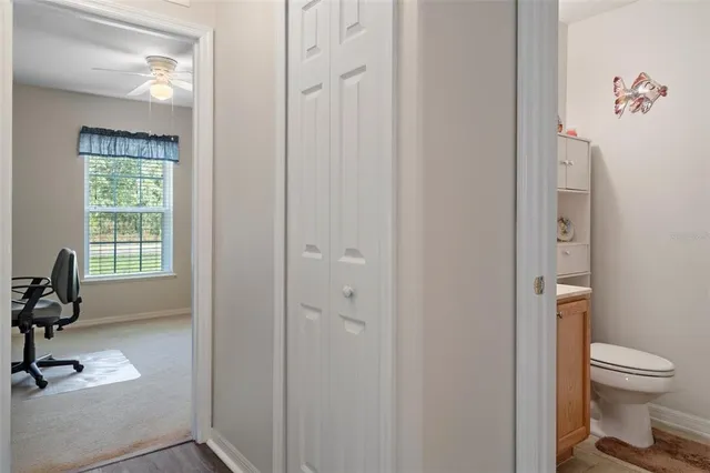 a bathroom with a toilet and a sink