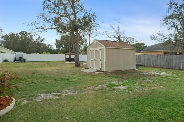 a view of a backyard with a garden