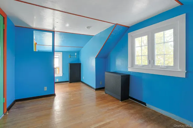 a view of empty room with windows