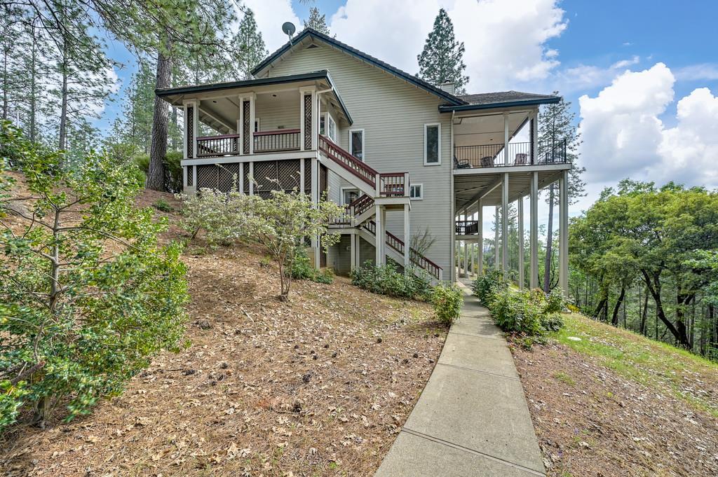 2358 Deer Ravine Court Cool, CA 95614 - Photo 58 of 63 rear view of property with stairs