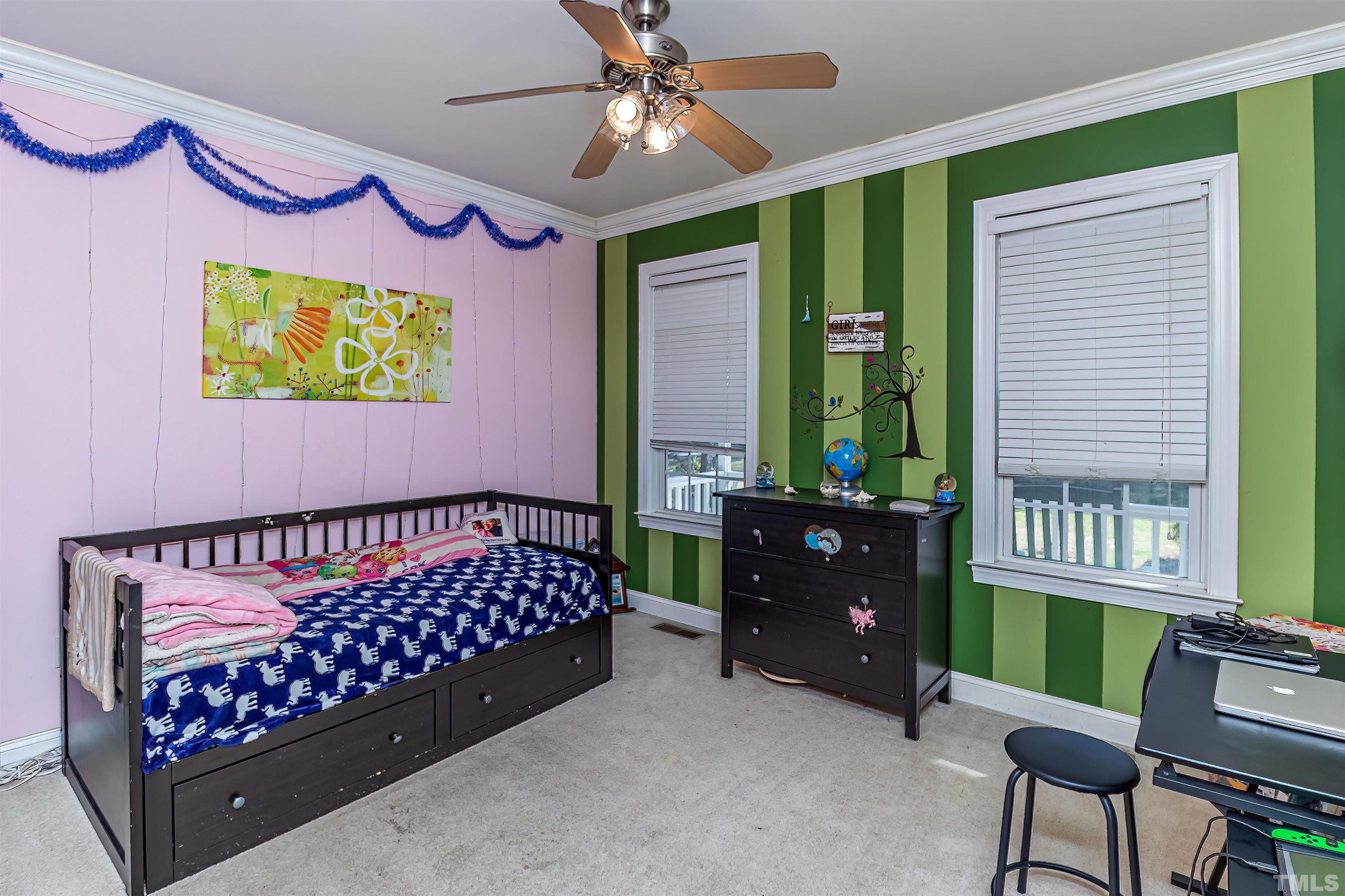 1197 Trotters Ridge Road Stem, NC 27581 - Photo 17 of 79 a bedroom with furniture and a window