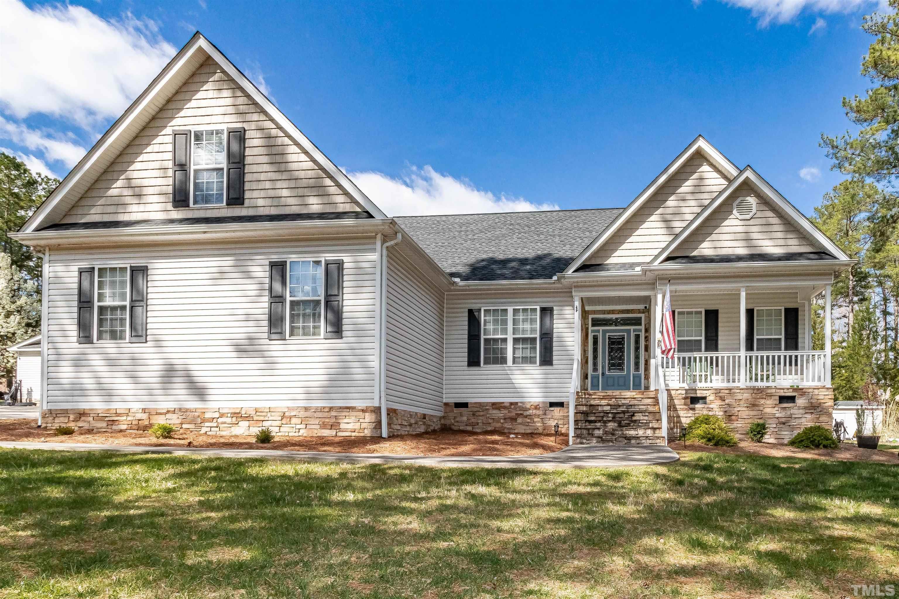 1197 Trotters Ridge Road Stem, NC 27581 - Photo 47 of 79 a front view of a house with a yard