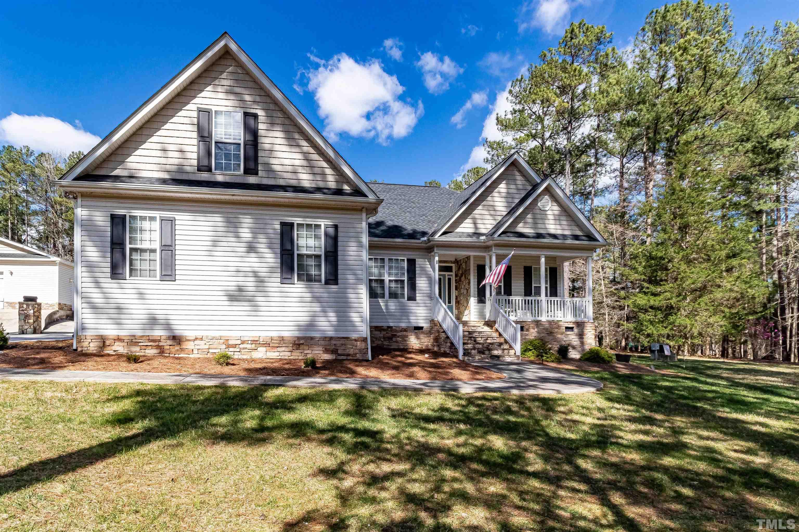 1197 Trotters Ridge Road Stem, NC 27581 - Photo 50 of 79 a front view of a house with a yard