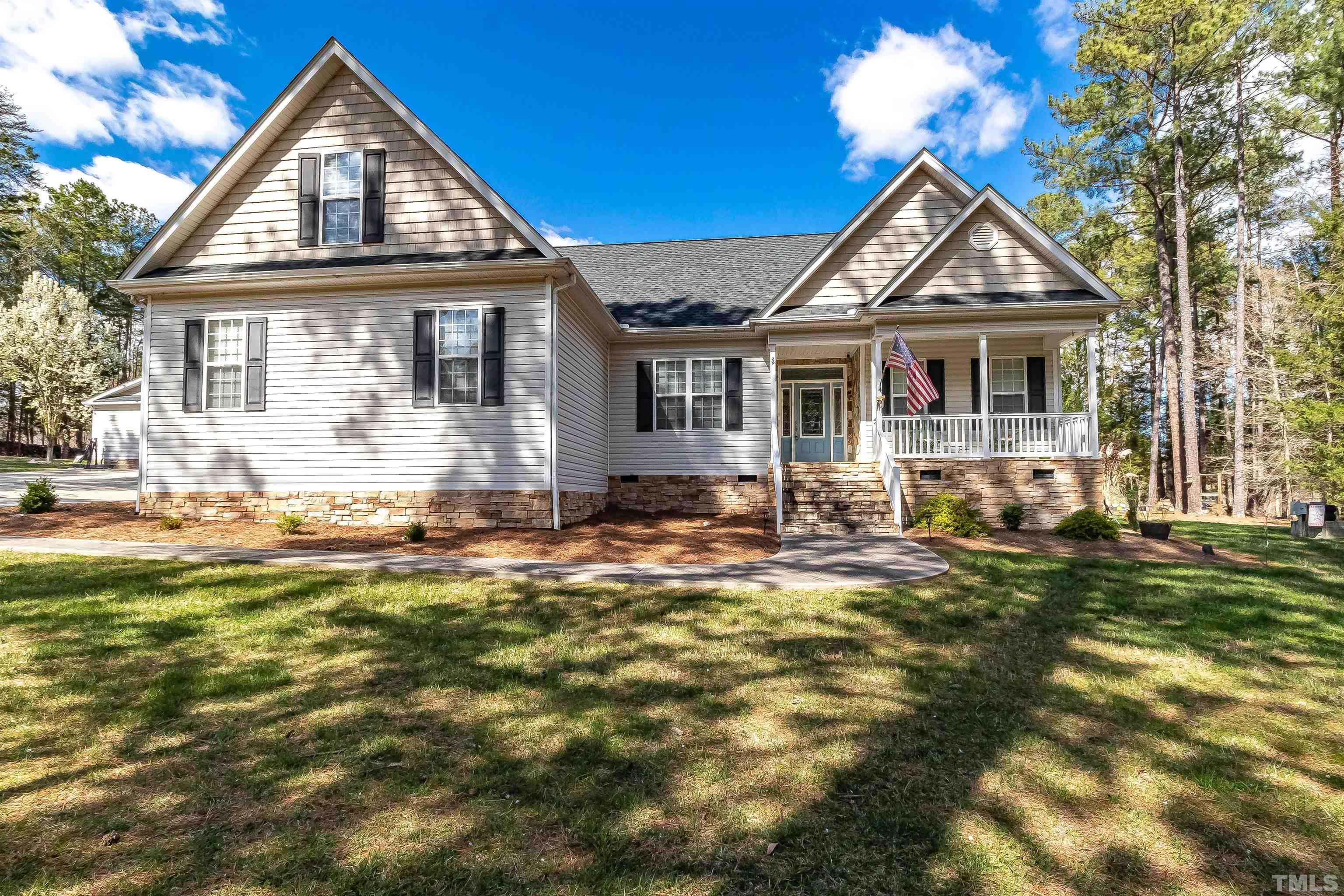 1197 Trotters Ridge Road Stem, NC 27581 - Photo 58 of 79 a front view of a house with a yard