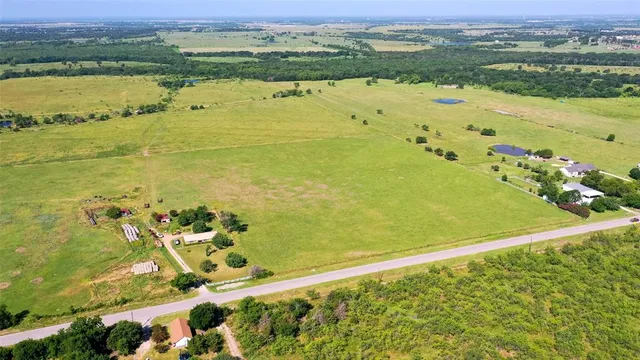 a view of an ocean and a mountain
