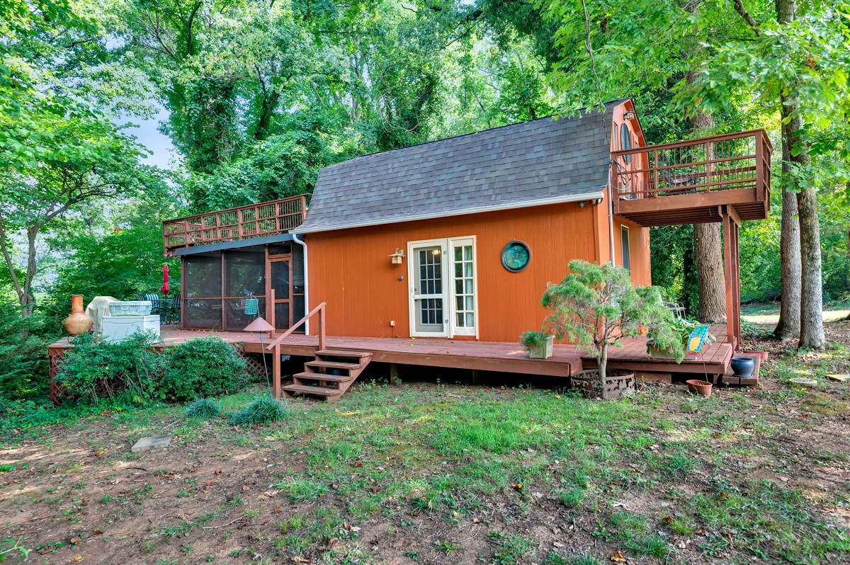 5591 Henry Road Athens, AL 35611 - Photo 1 of 23 a front view of a house with garden