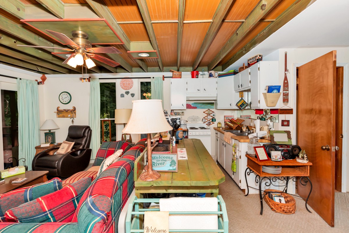 5591 Henry Road Athens, AL 35611 - Photo 6 of 23 a room with lots of furniture and musical instruments