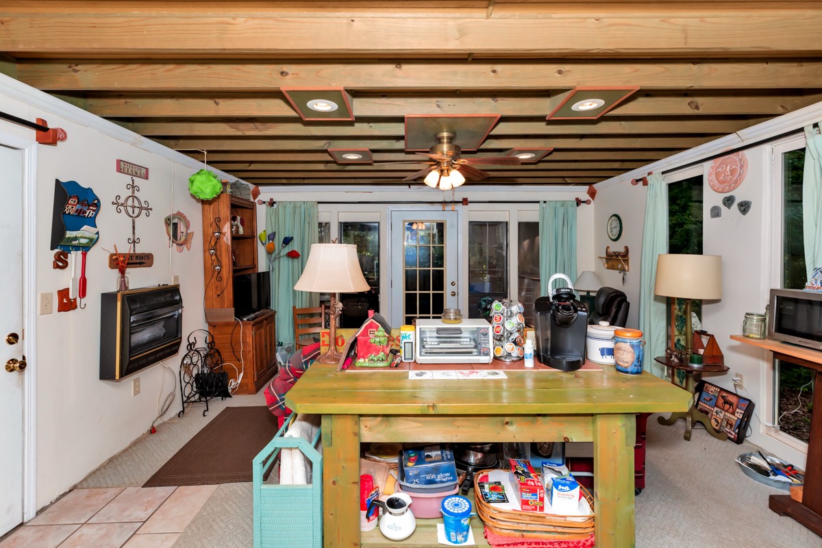 5591 Henry Road Athens, AL 35611 - Photo 8 of 23 a view of a dining area with furniture and chandelier