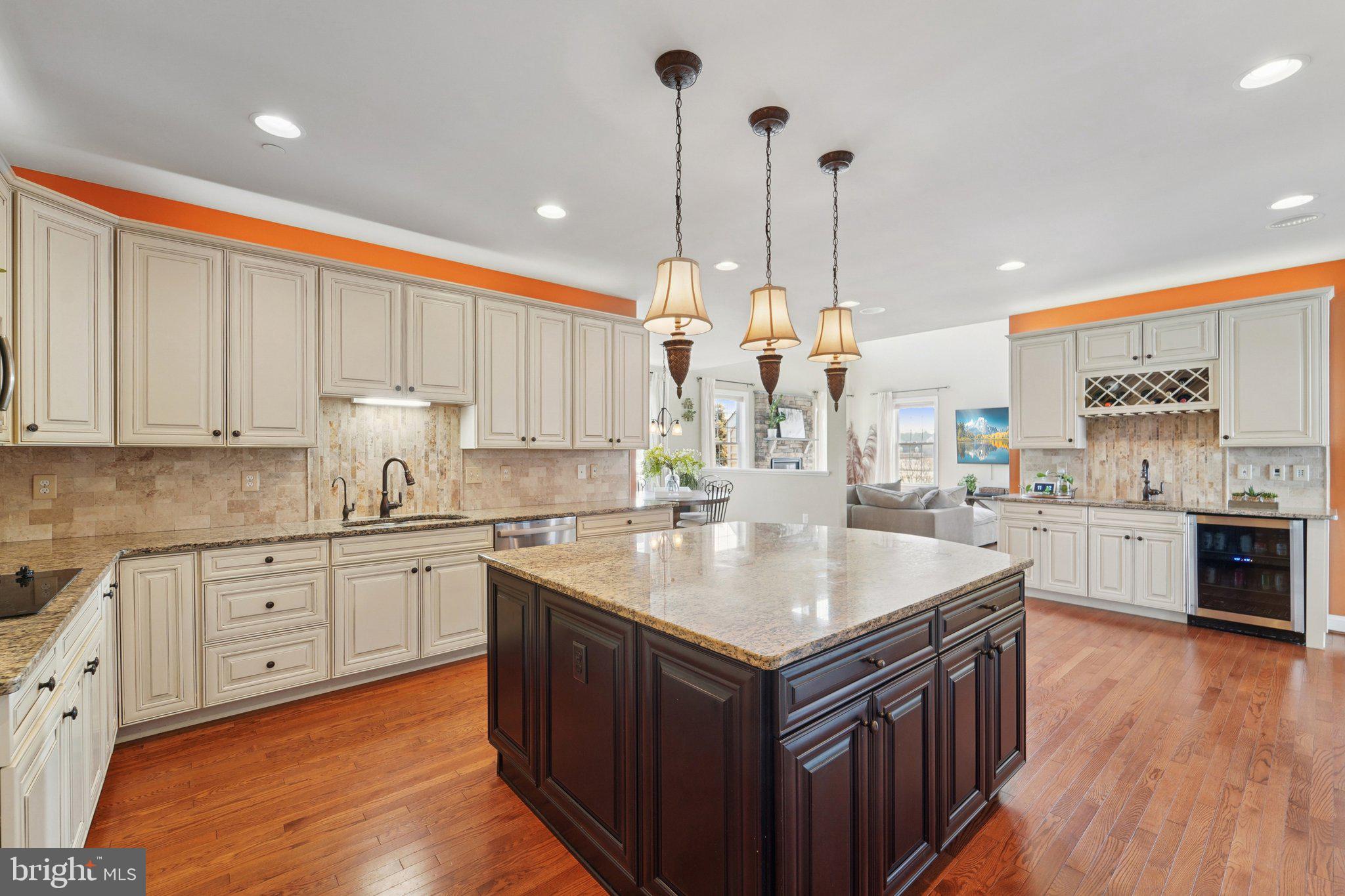 420 Irish Rebel Road Westminster, MD 21157 - Photo 19 of 71 a kitchen with kitchen island granite countertop a sink counter and cabinets