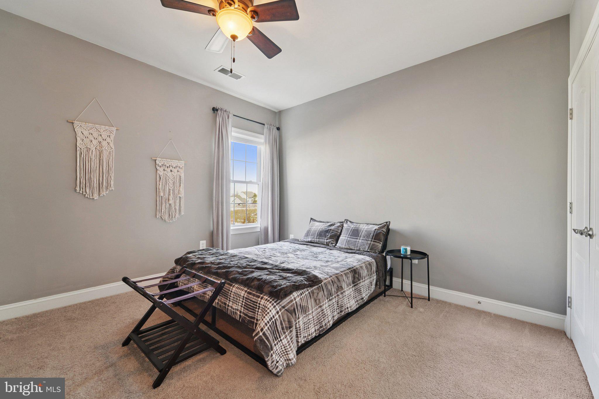 420 Irish Rebel Road Westminster, MD 21157 - Photo 36 of 71 a bedroom with a bed and window