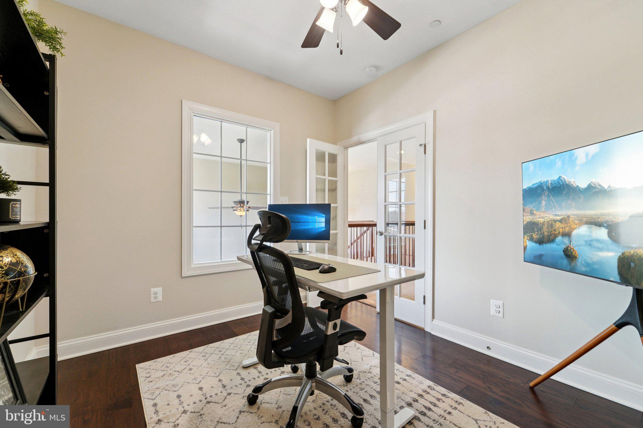 420 Irish Rebel Road Westminster, MD 21157 - Photo 38 of 71 a view of a workspace with furniture and wooden floor