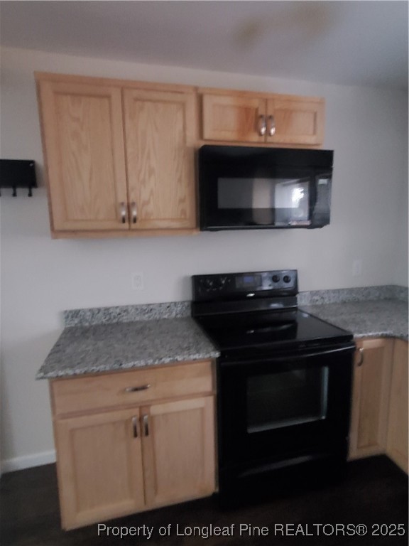 Undisclosed Address Fayetteville, NC 28305 - Photo 12 of 15 a kitchen with stainless steel appliances granite countertop a sink and a stove