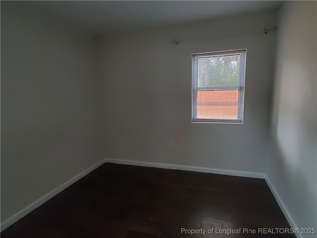 Undisclosed Address Fayetteville, NC 28305 - Photo 10 of 15 an empty room with a window