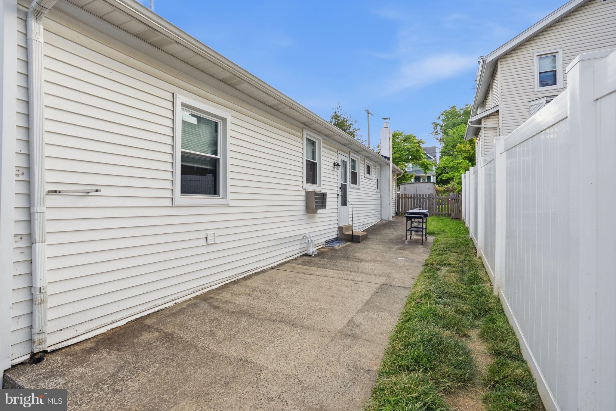 303 Radcliffe Road Glenside, PA 19038 - Photo 26 of 36 a view of a backyard with potted plants