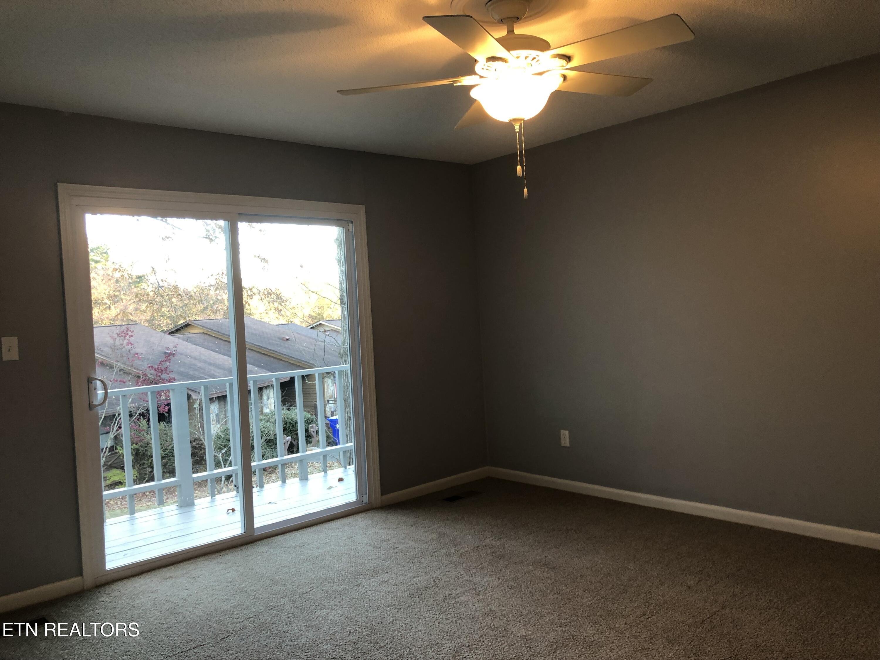 107 Hazleton Lane Oak Ridge, TN 37830 - Photo 13 of 26 Primary Bedroom to Private Deck