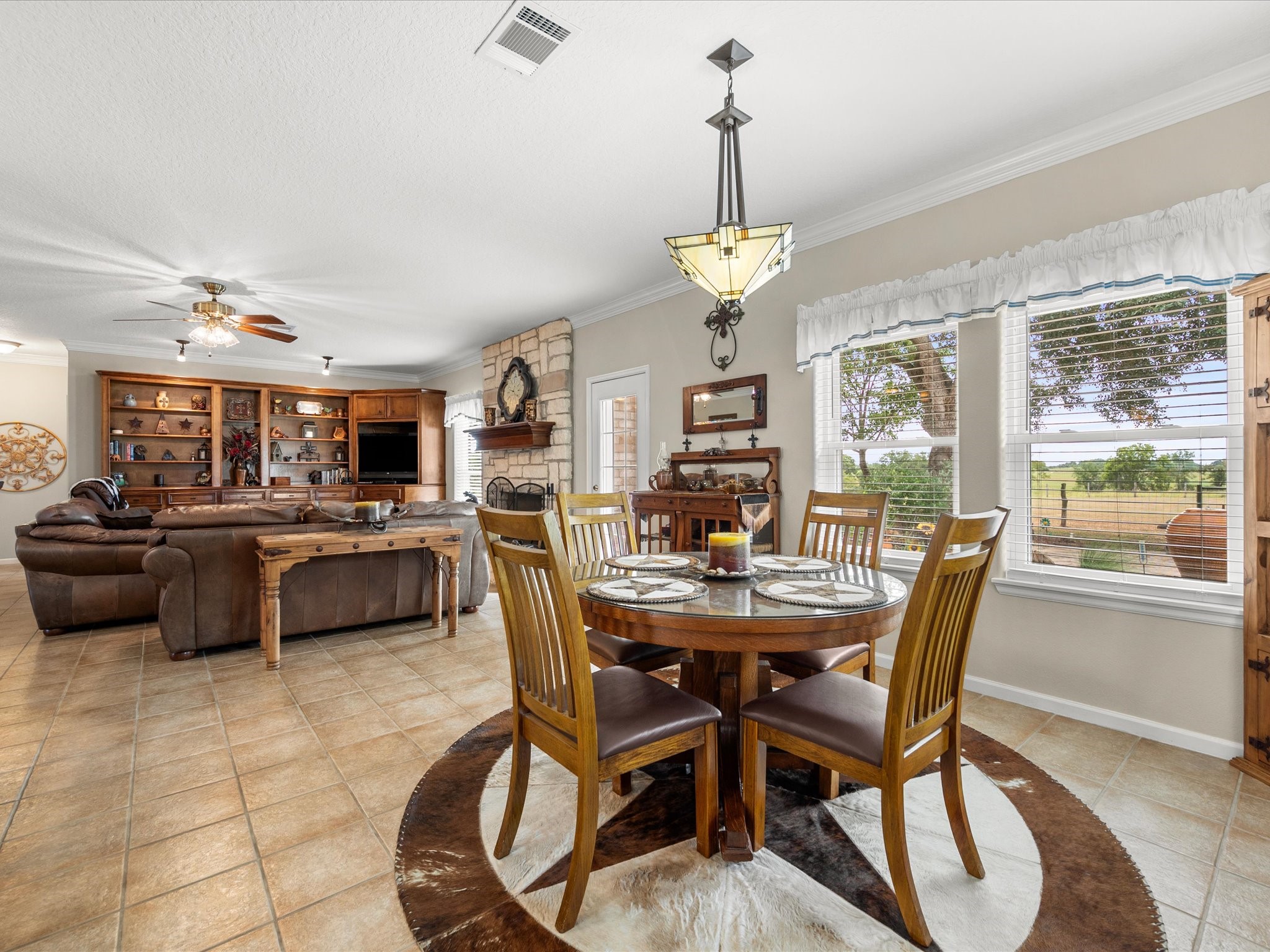 19929 Pierceall Road Hempstead, TX 77445 - Photo 49 of 50 The open floor plan connects the dining and living spaces, making it easy to entertain friends and loved ones.