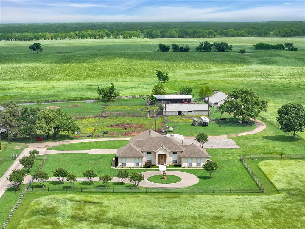 a view of a golf course with a garden