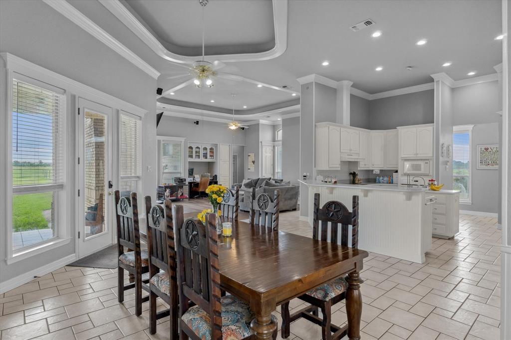 7182 Fm 2451 Road Scurry, TX 75158 - Photo 16 of 37 a view of a dining room with furniture