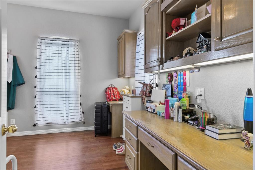 7182 Fm 2451 Road Scurry, TX 75158 - Photo 28 of 37 a view of a kitchen with fridge and sink
