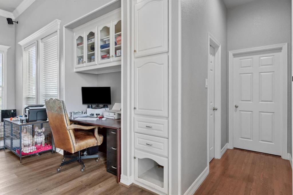 7182 Fm 2451 Road Scurry, TX 75158 - Photo 10 of 37 a view of a workspace with furniture and a window
