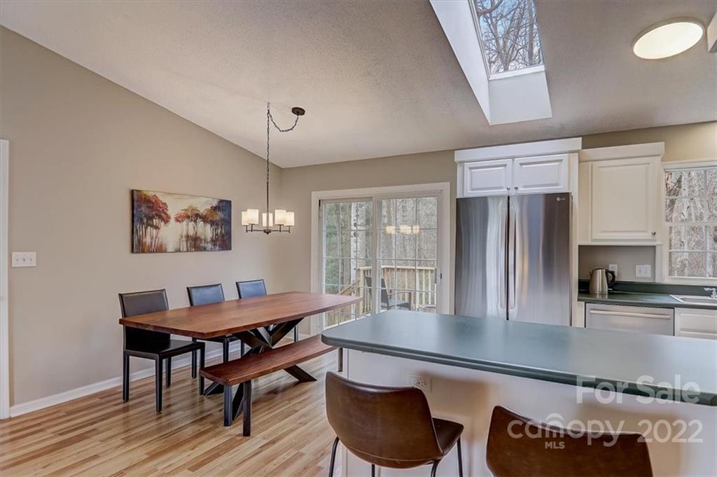 497 Fanning Bridge Road Fletcher, NC 28732 - Photo 18 of 41 a dining room with furniture and window