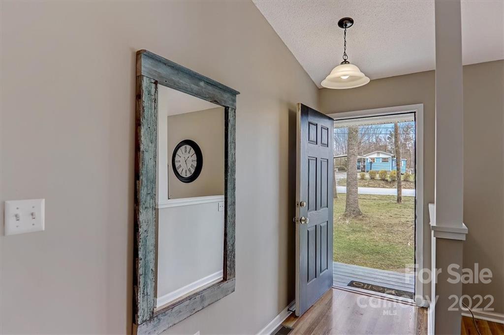 497 Fanning Bridge Road Fletcher, NC 28732 - Photo 24 of 41 a view of an entryway with wooden floor and door