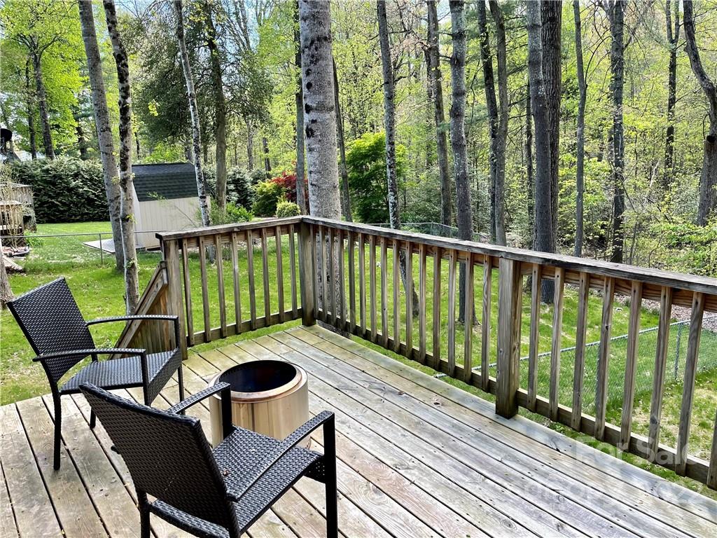 497 Fanning Bridge Road Fletcher, NC 28732 - Photo 38 of 41 a view of balcony with furniture and garden