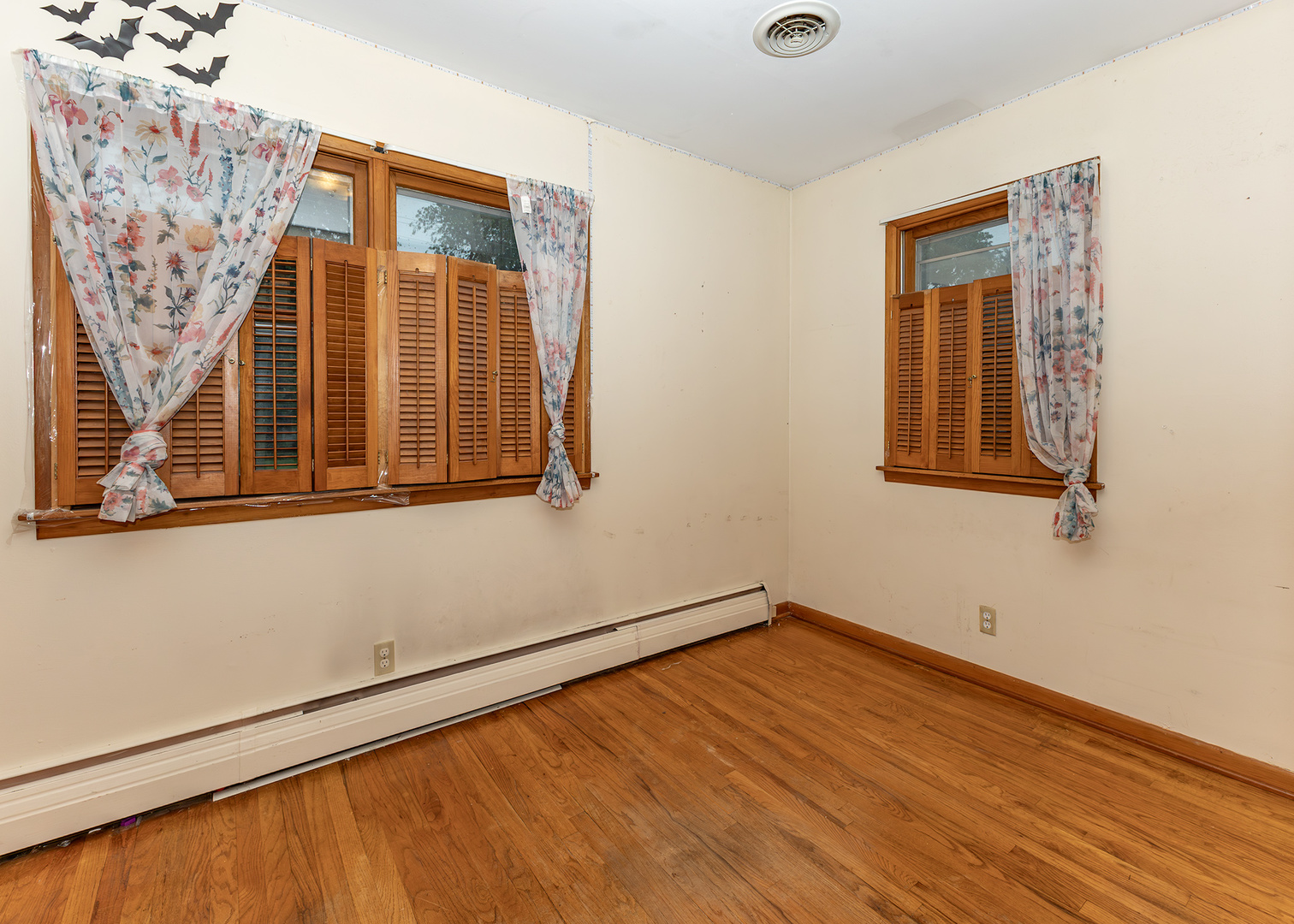 1608 3rd Street Camanche, IA 52730 - Photo 12 of 25 a view of a room with wooden floor and windows