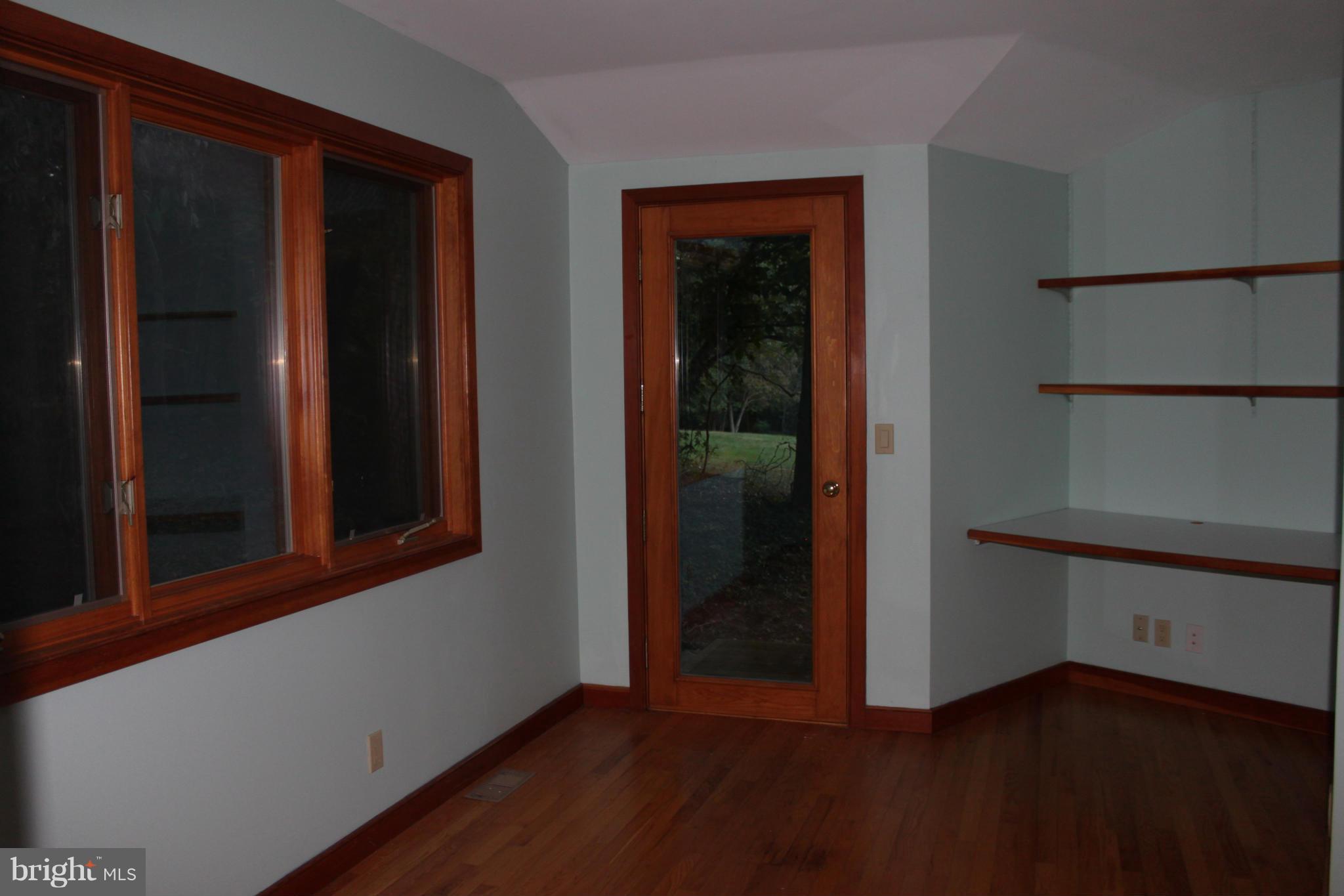 201 Hunters Road Washington, VA 22747 - Photo 11 of 30 Office with built in workspace and exterior door