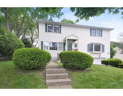 45 Yerxa Road Arlington, MA 02474 - Photo 1 of 35 a front view of a house with a garden