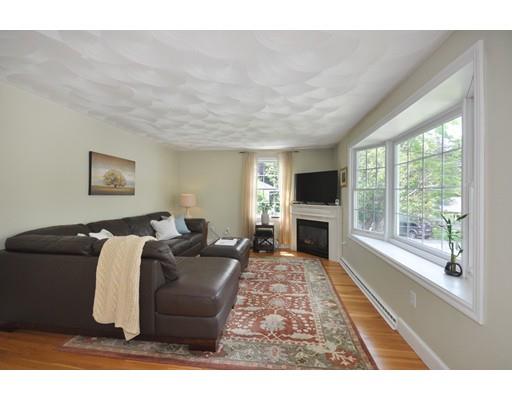 45 Yerxa Road Arlington, MA 02474 - Photo 8 of 35 a living room with furniture and a fireplace