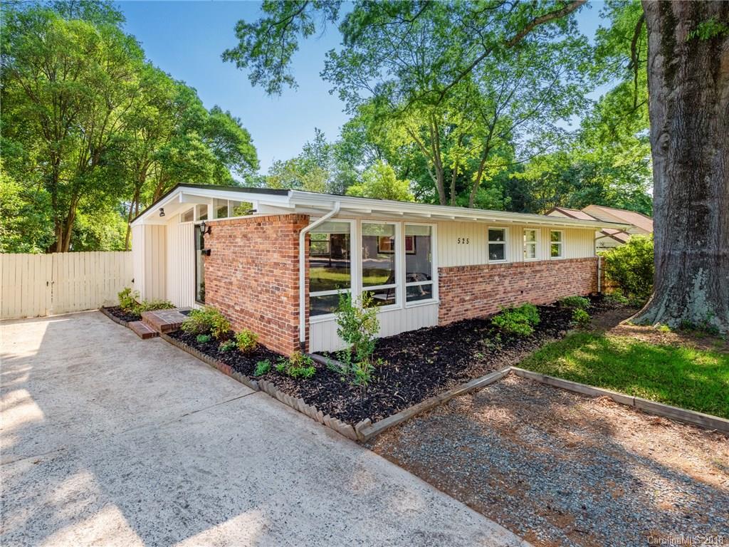 525 Scaleybark Road Charlotte, NC 28209 - Photo 2 of 24 a view of a house with backyard and garden