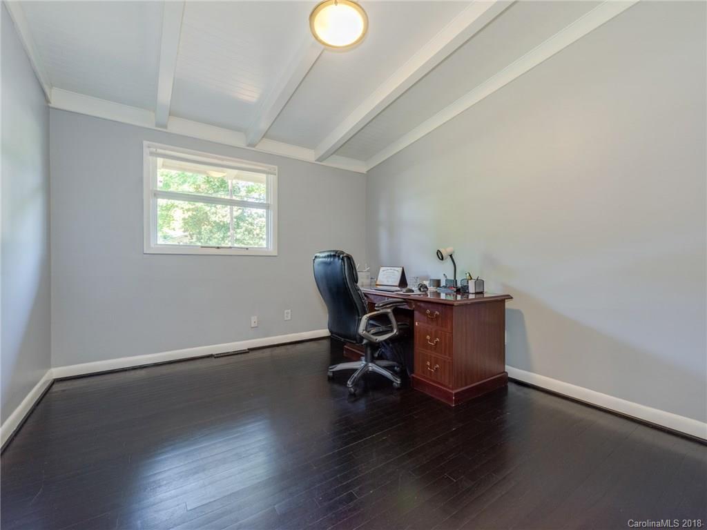 525 Scaleybark Road Charlotte, NC 28209 - Photo 12 of 24 a workspace with furniture and a window