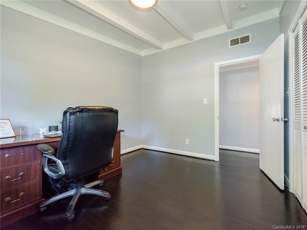 525 Scaleybark Road Charlotte, NC 28209 - Photo 13 of 24 a view of workspace with wooden floor and windows