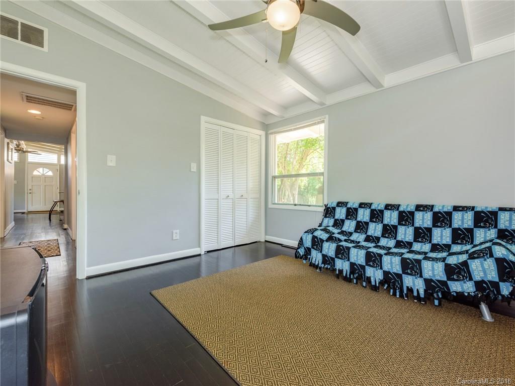 525 Scaleybark Road Charlotte, NC 28209 - Photo 15 of 24 a bedroom with bed and window