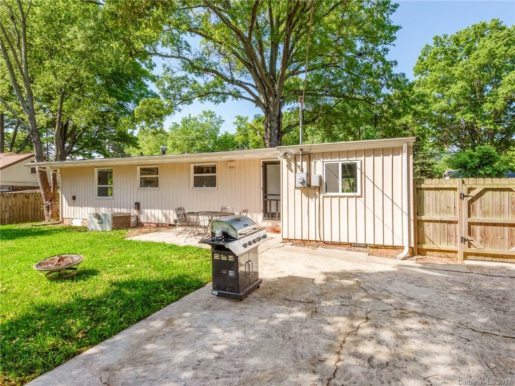 525 Scaleybark Road Charlotte, NC 28209 - Photo 23 of 24 a backyard of a house with seating space