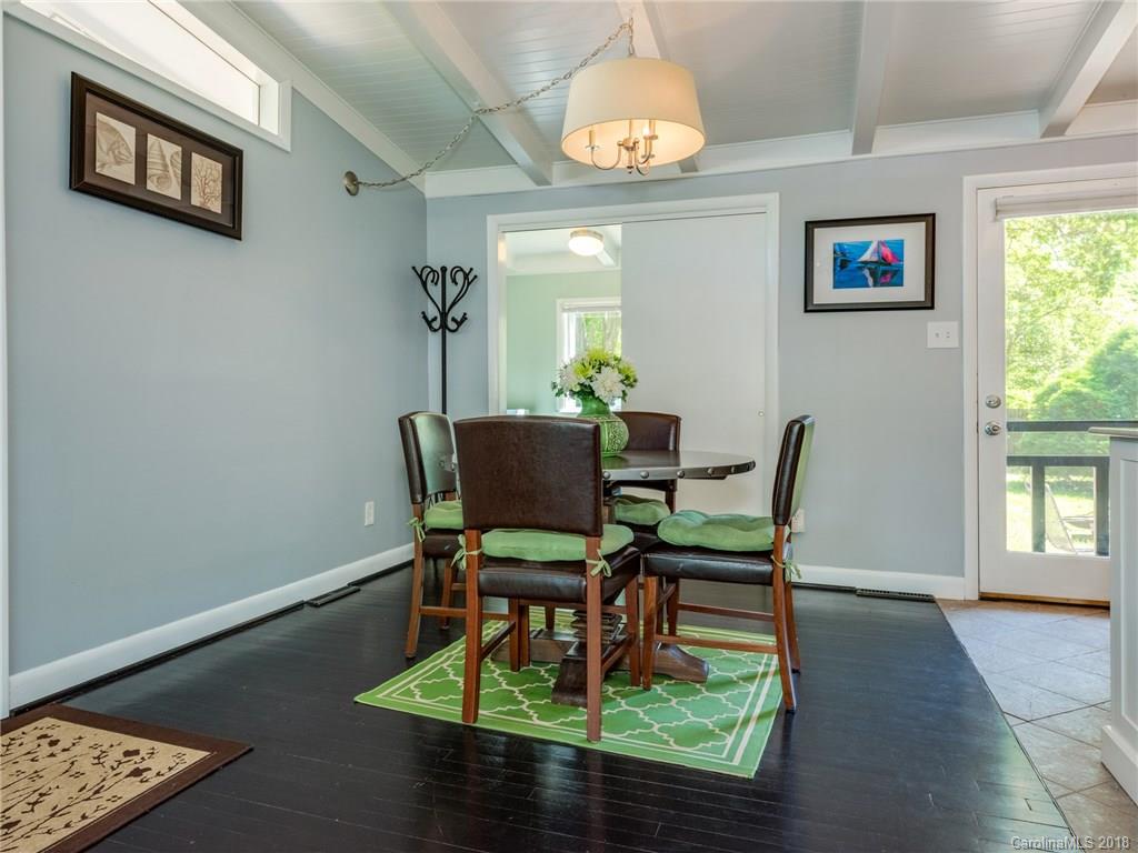 525 Scaleybark Road Charlotte, NC 28209 - Photo 6 of 24 a dining room with furniture and window