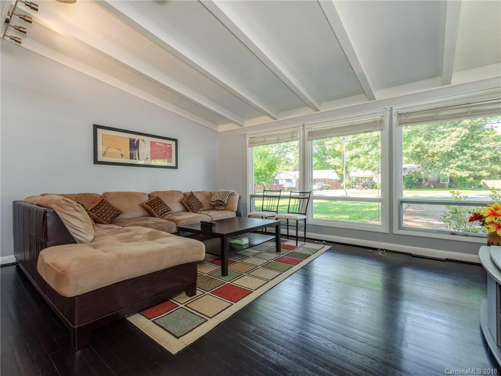 525 Scaleybark Road Charlotte, NC 28209 - Photo 7 of 24 a living room with furniture and a large window