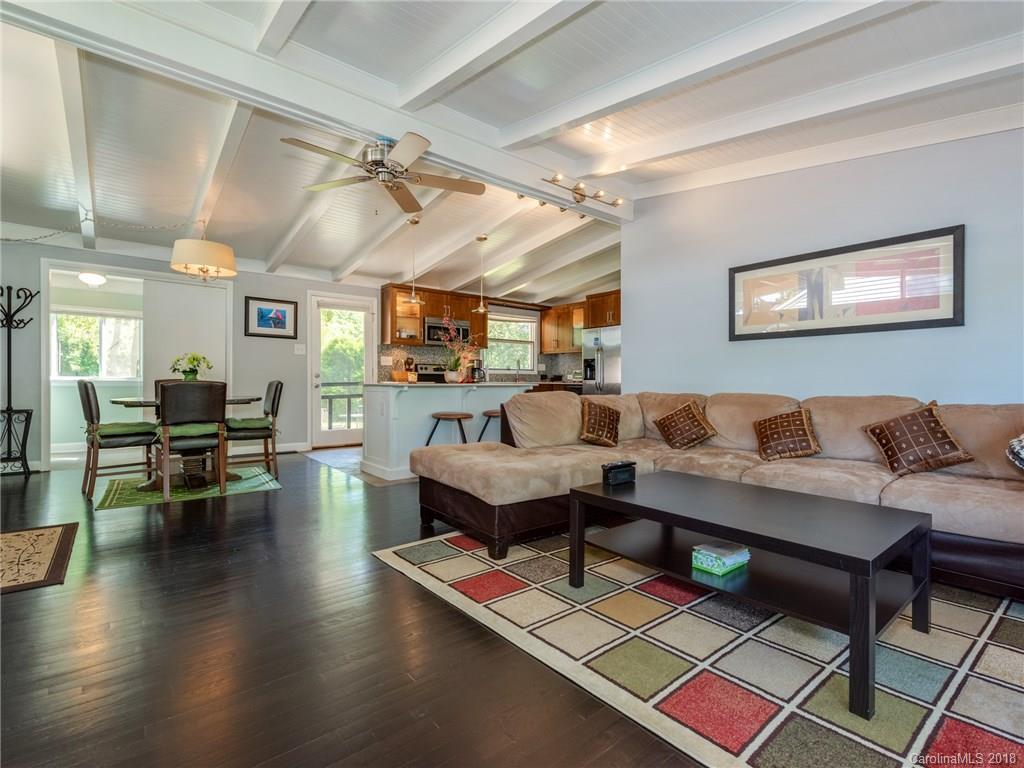 525 Scaleybark Road Charlotte, NC 28209 - Photo 8 of 24 a living room with furniture and wooden floor